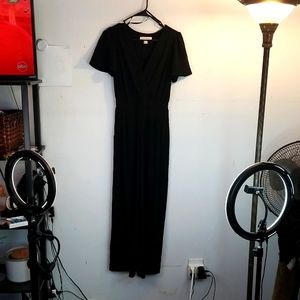 Jumpsuit black one piece size petite. Med